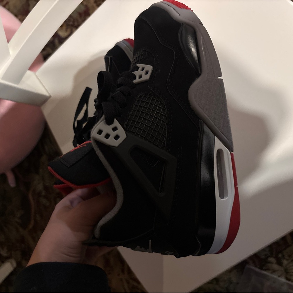 Black and Red Jordan 4 Sneakers